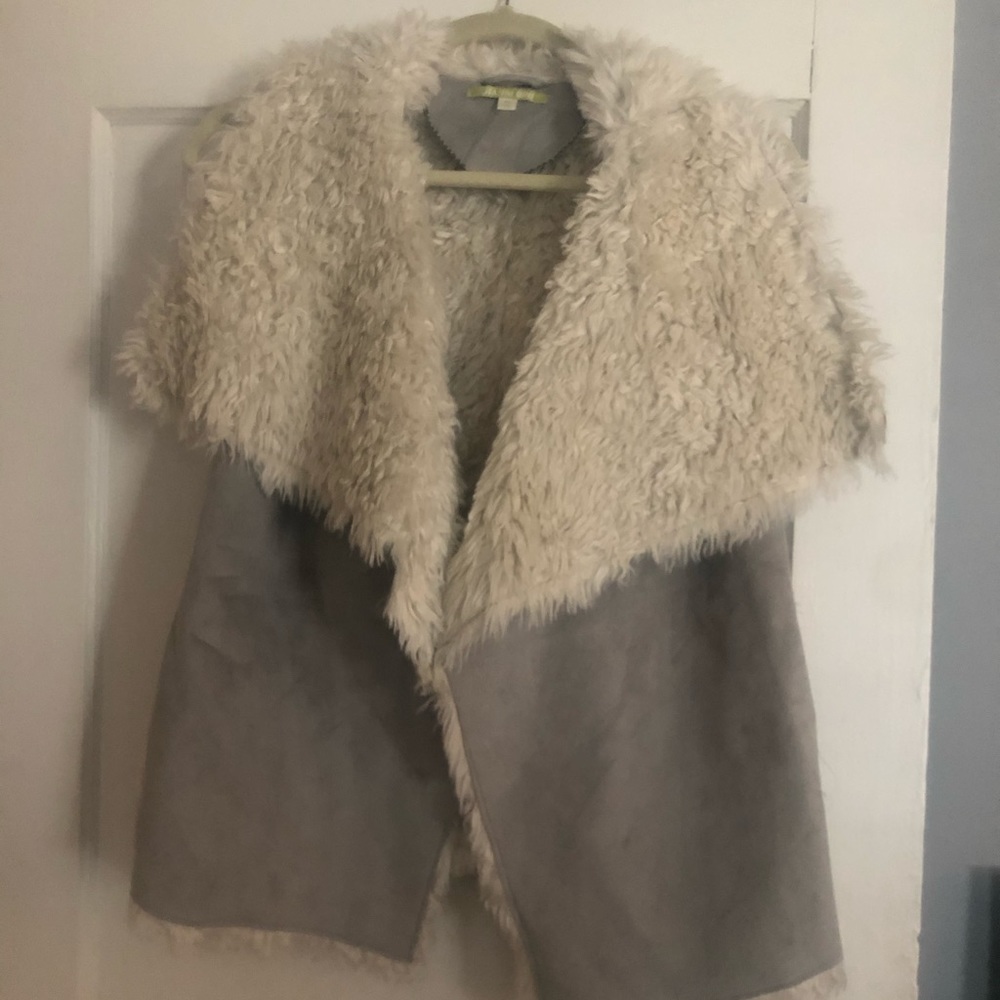 Faux suede and fur vest.